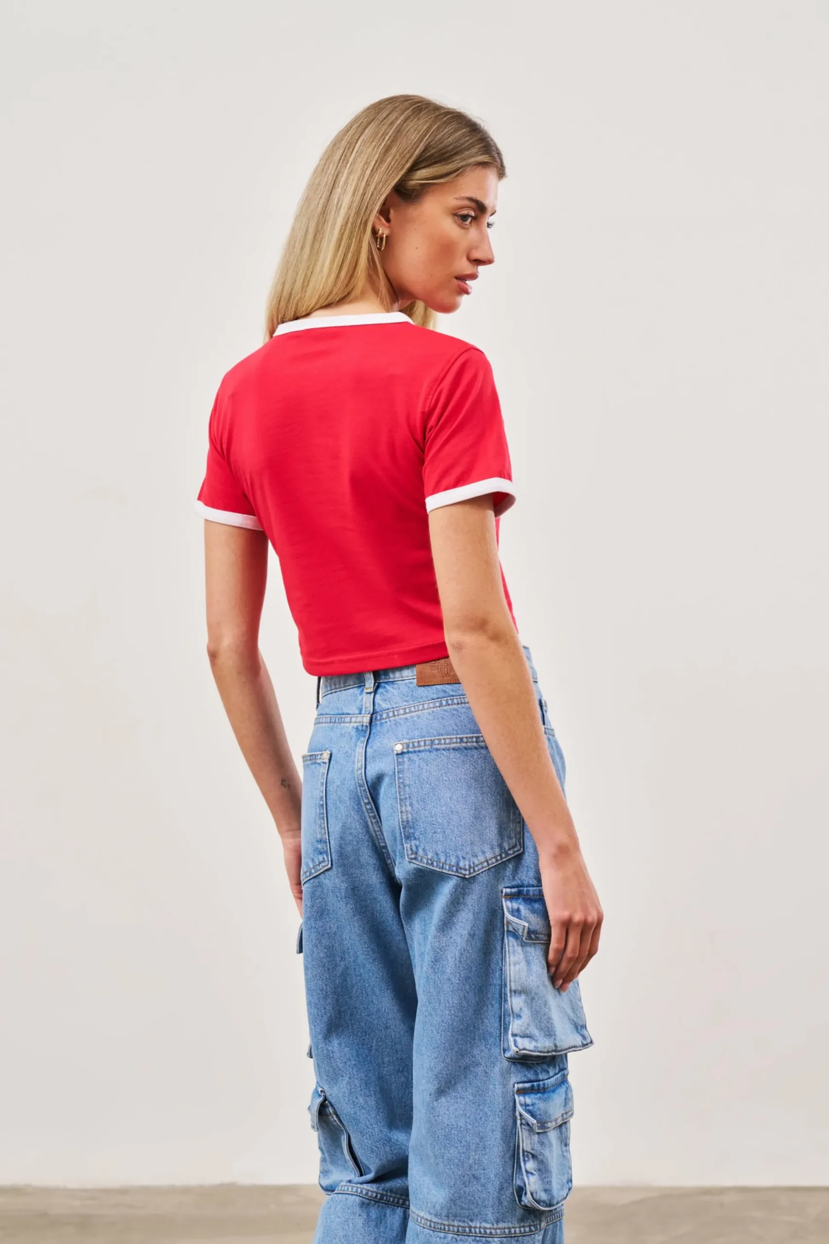 couture_emblem_ringer_bab_3-1.webp The Couture Club Couture Emblem Ringer Baby Tee