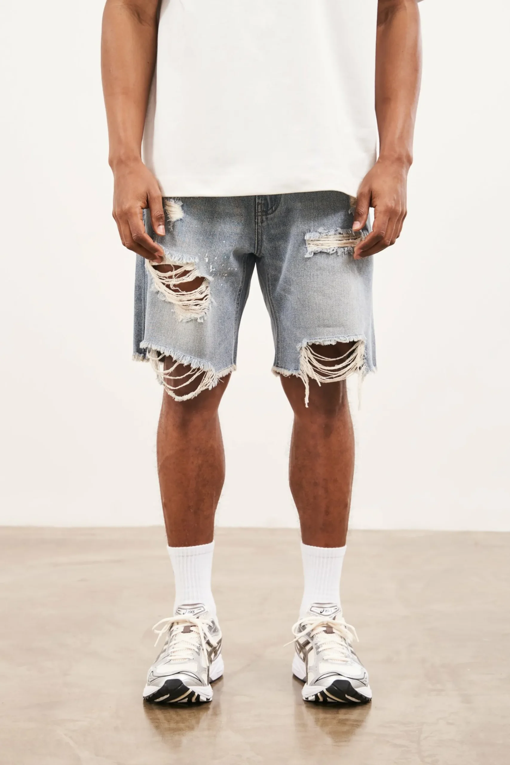 distressed_raw_hem_denim__1-1.webp The Couture Club Distressed Raw Hem Denim Shorts