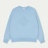 The Couture Club Emblem Embossed Oversized Sweatshirt