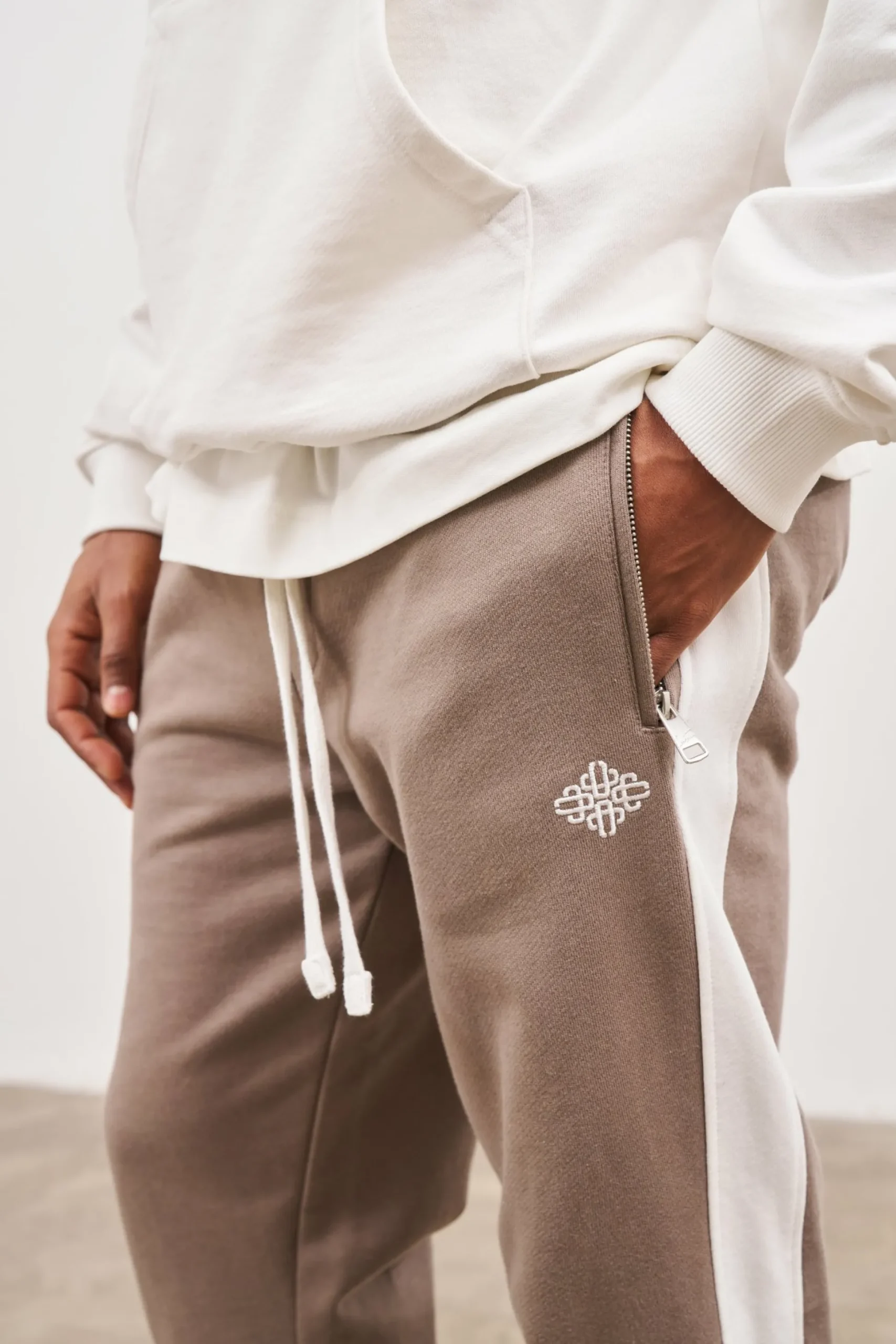 emblem_side_panel_split_h_3-2.webp The Couture Club Emblem Side Panel Split Hem Joggers