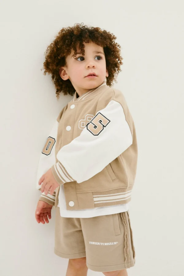 The Couture Club Kids Emblem Varsity Bomber Jacket