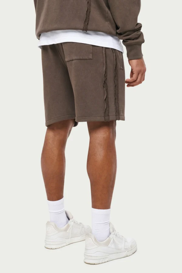 The Couture Club Raw Seam Distressed Shorts