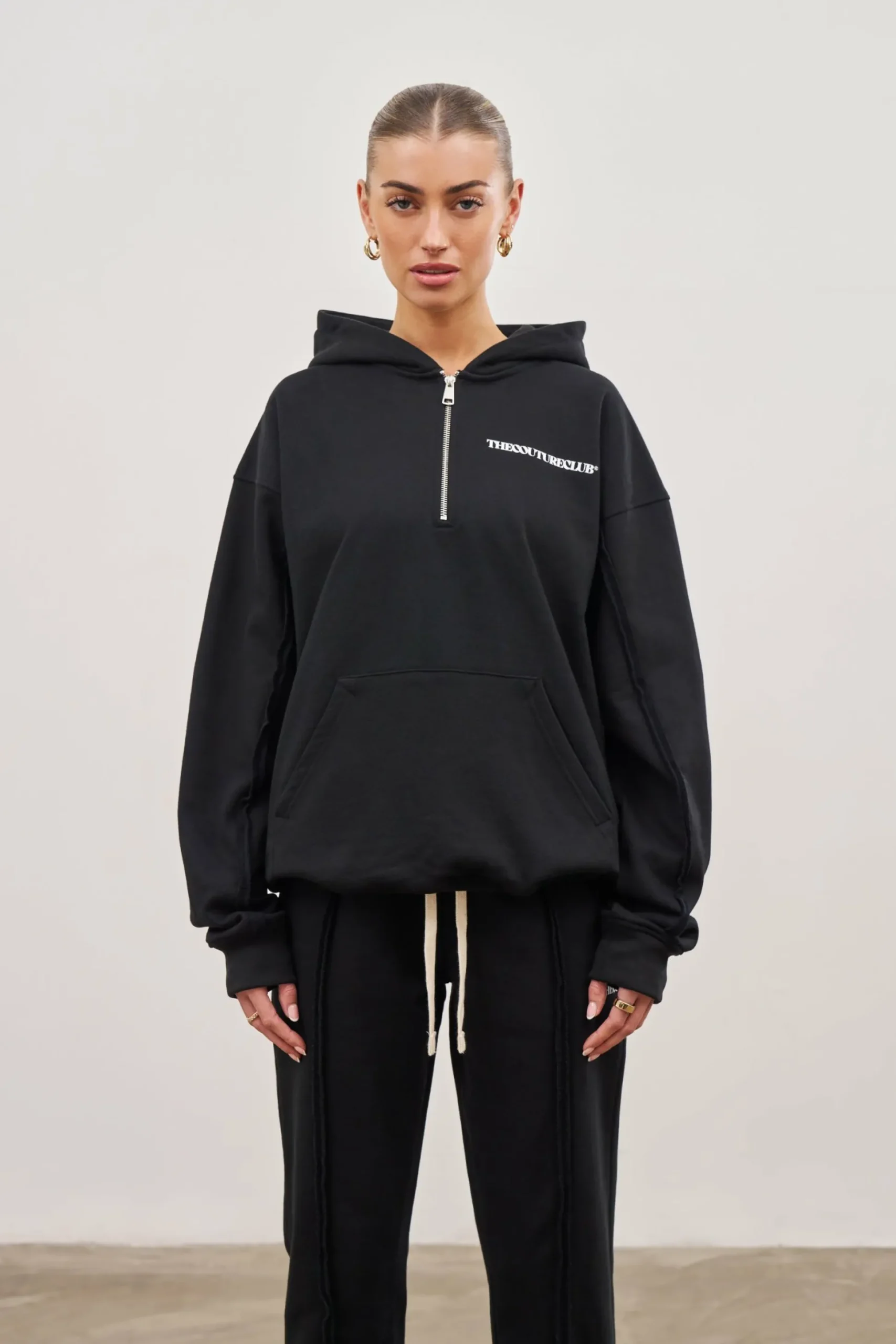 raw_seam_quarter_zip_hood_3-11.webp The Couture Club Raw Seam Quarter Zip Hoodie