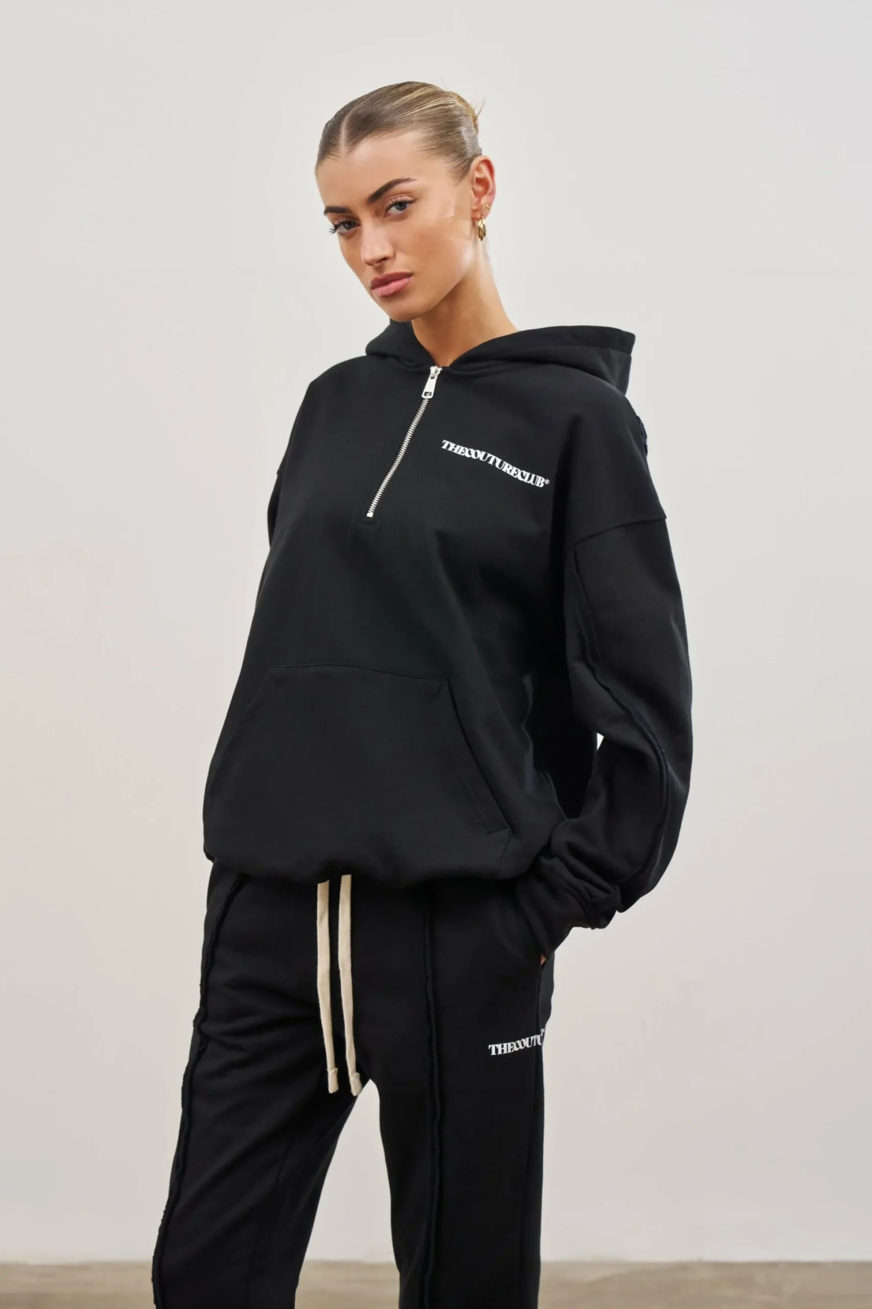 raw_seam_quarter_zip_hood_4-11.webp The Couture Club Raw Seam Quarter Zip Hoodie