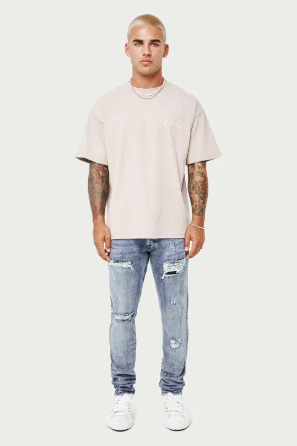 The Couture Club Rip And Repair Stacked Jeans